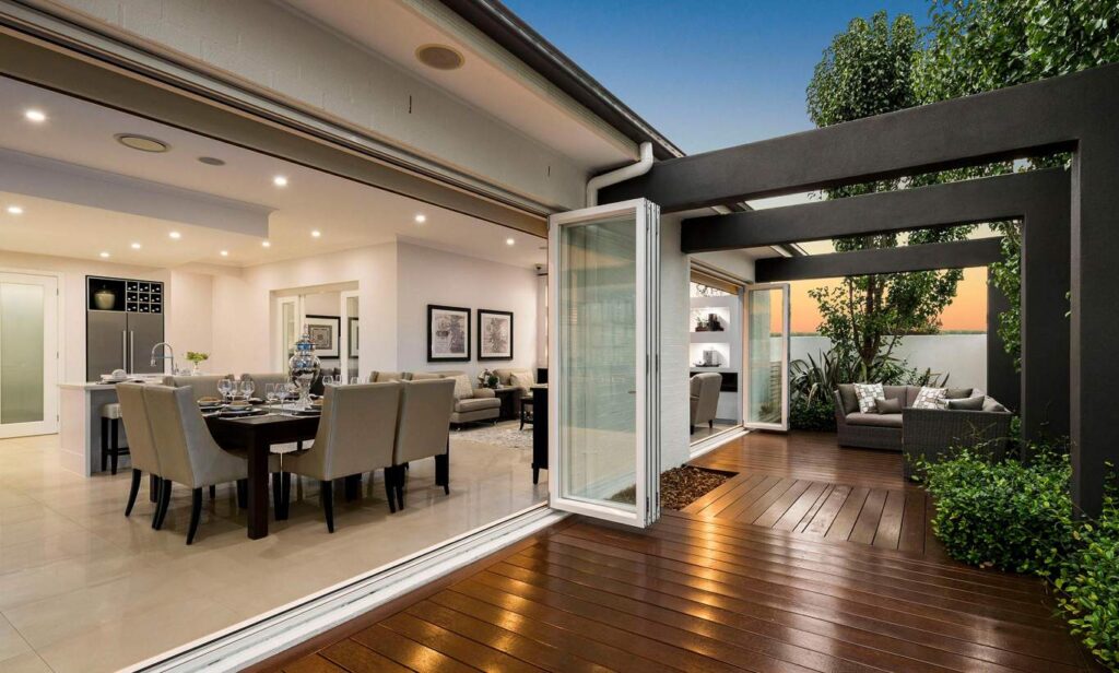 Folding glass doors open to garden
