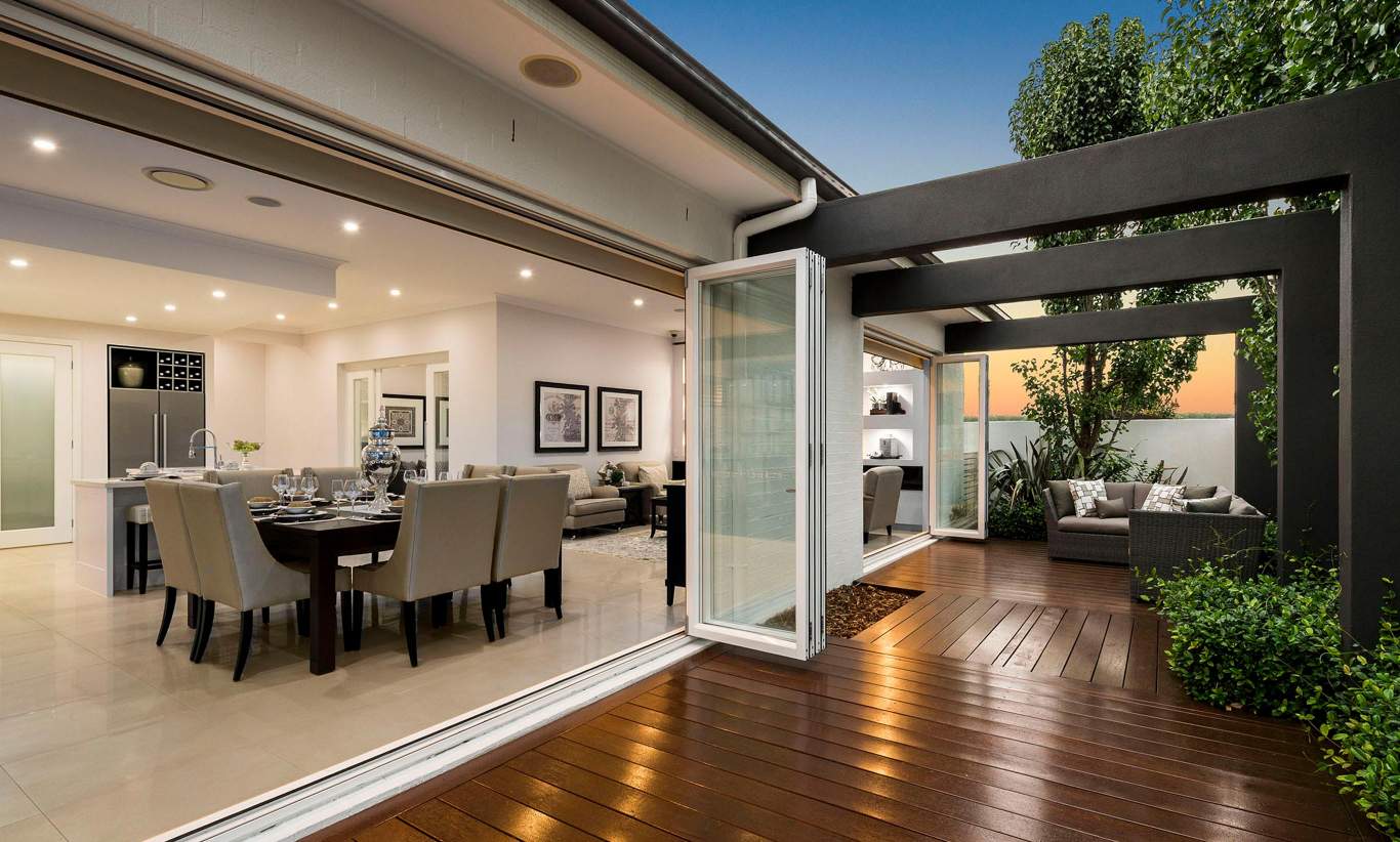 Folding glass doors open to garden