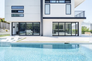 Modern aluminum bifold doors open wide bringing natural light